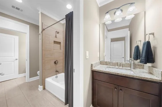 an aerial view of a house with a garden