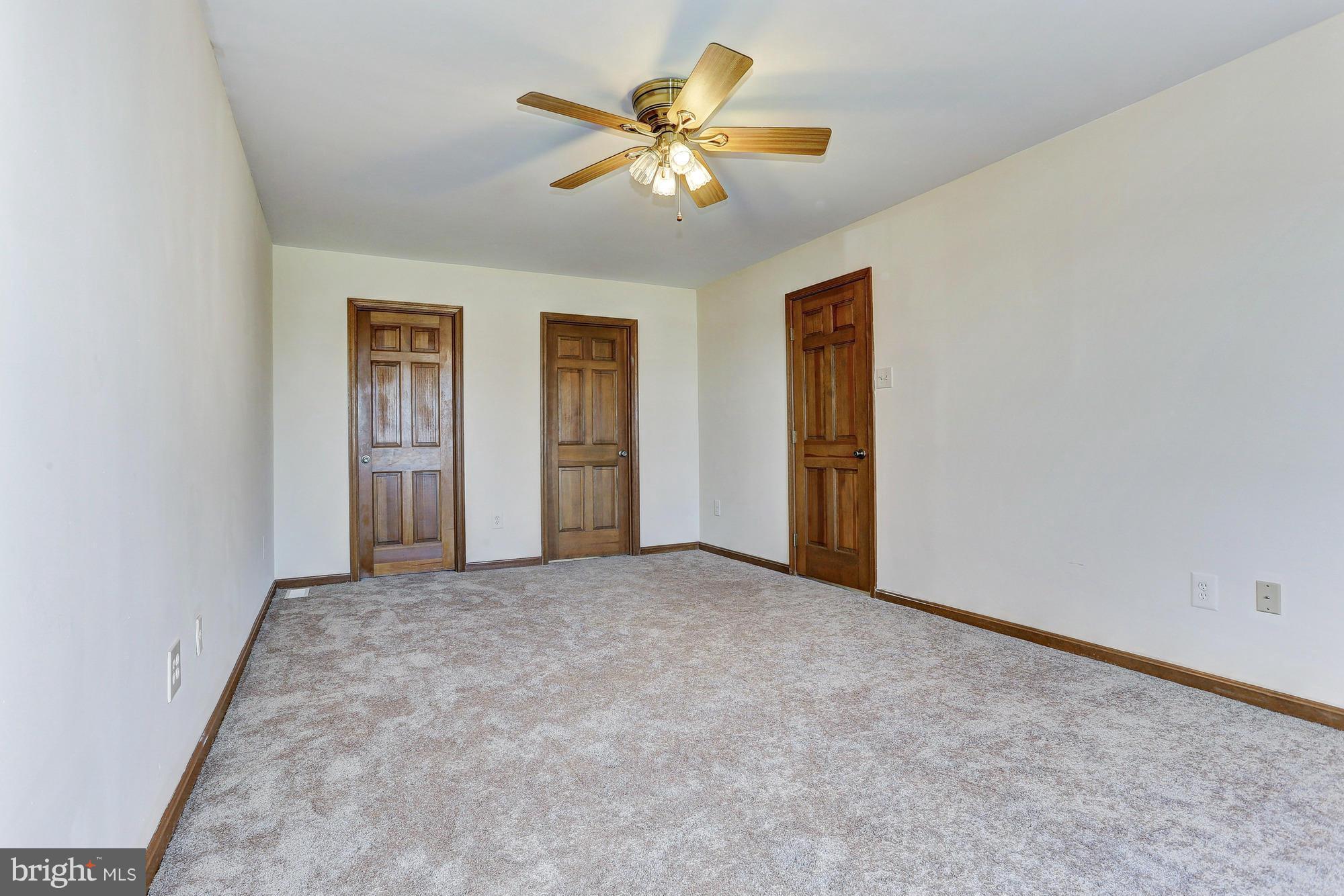 602 Rivershore Court Edgewood, MD 21040 - Photo 14 of 28 an empty room with closet and fan
