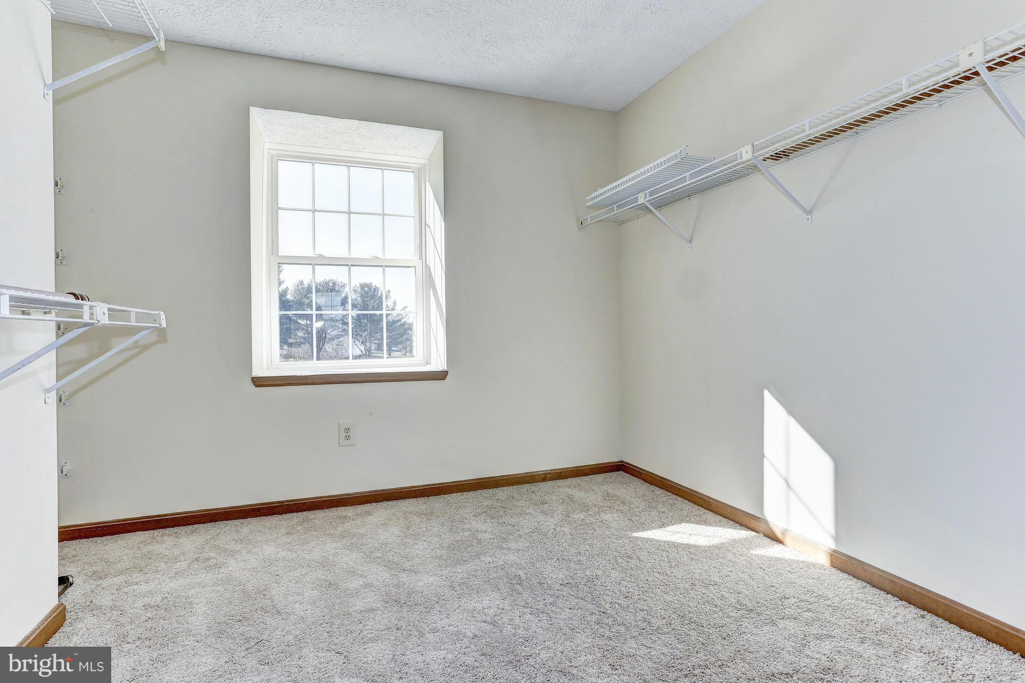 602 Rivershore Court Edgewood, MD 21040 - Photo 17 of 28 an empty room with windows