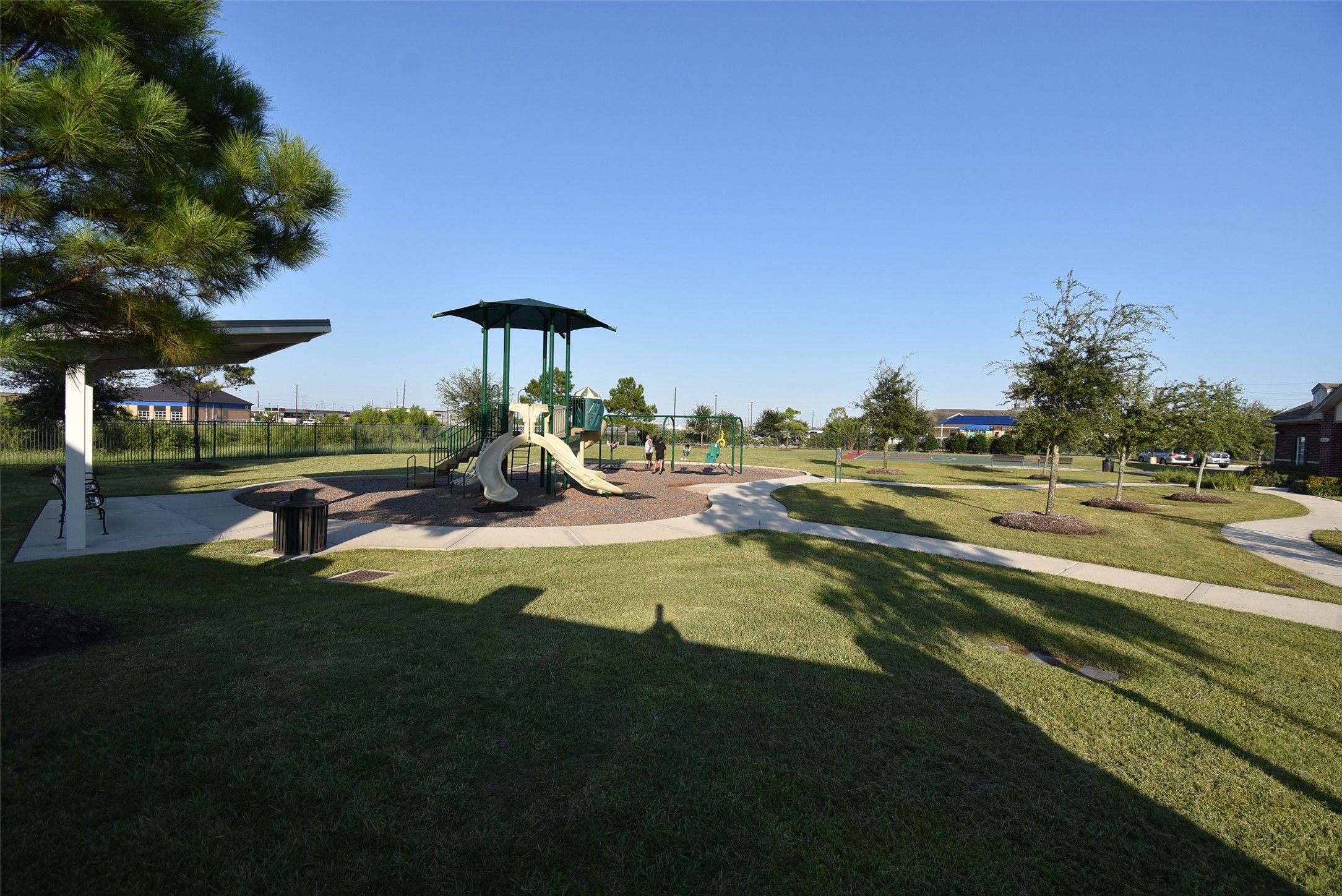 20602 Riley Copper Drive Cypress, TX 77433 - Photo 16 of 32 a view of a swimming pool with an outdoor space and seating area