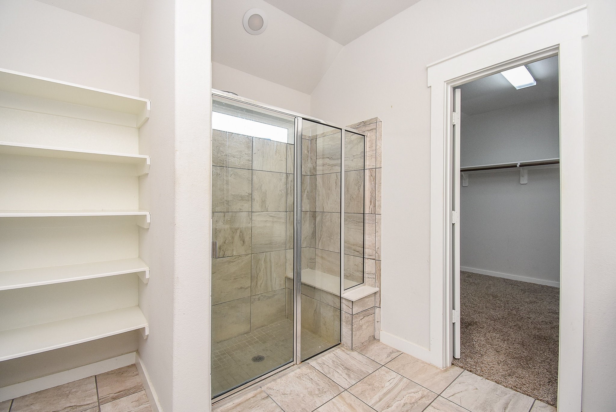 20602 Riley Copper Drive Cypress, TX 77433 - Photo 17 of 32 a bathroom with a shower and a toilet