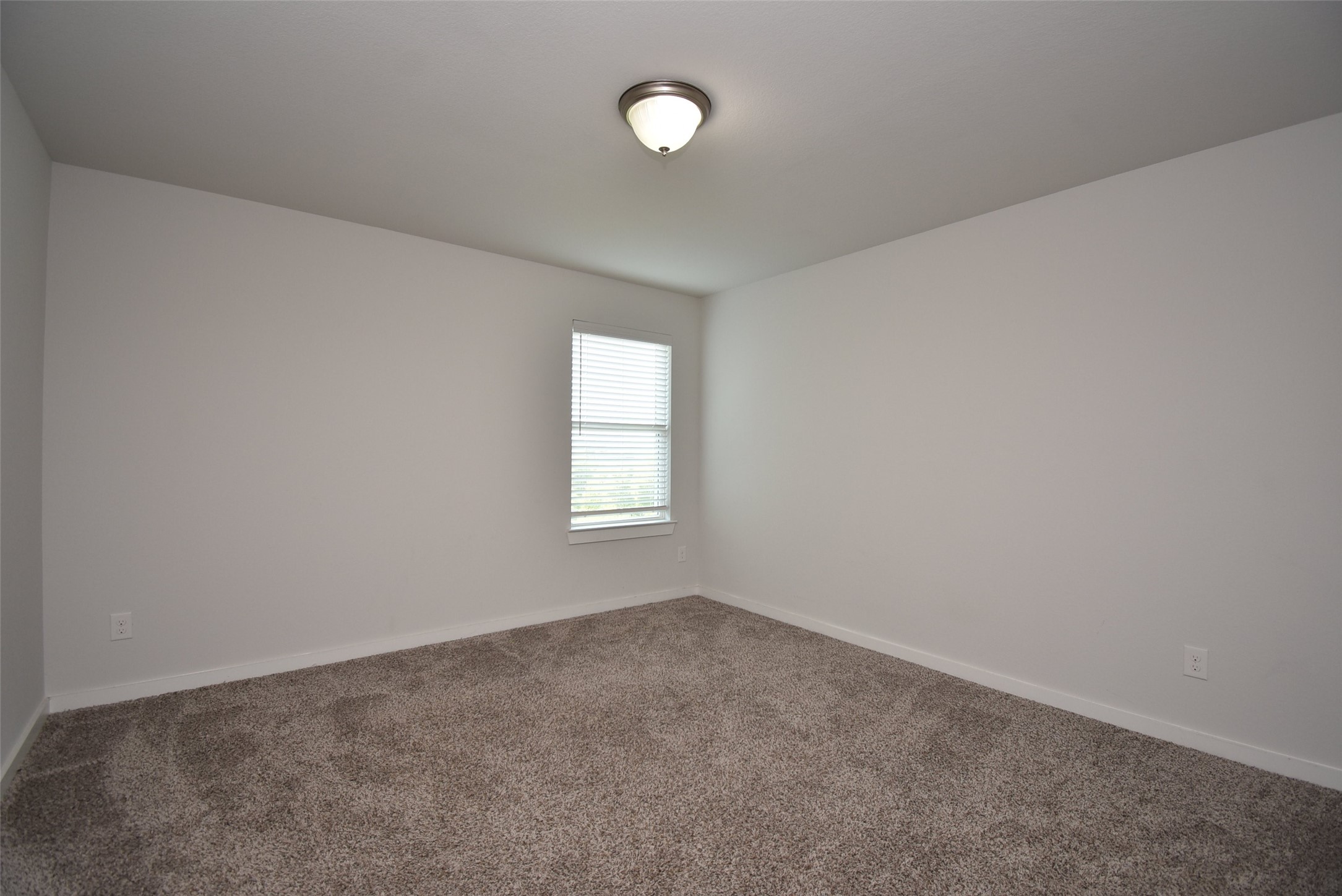 20602 Riley Copper Drive Cypress, TX 77433 - Photo 21 of 32 an empty room with a window