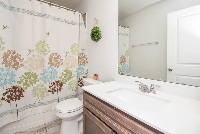 a view of walk in closet with window