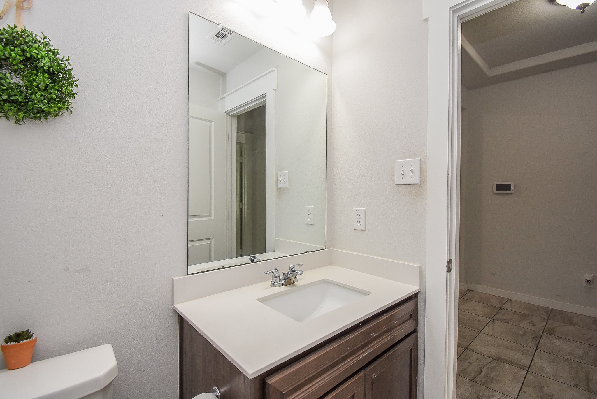 20602 Riley Copper Drive Cypress, TX 77433 - Photo 23 of 32 a bathroom with a sink and a toilet