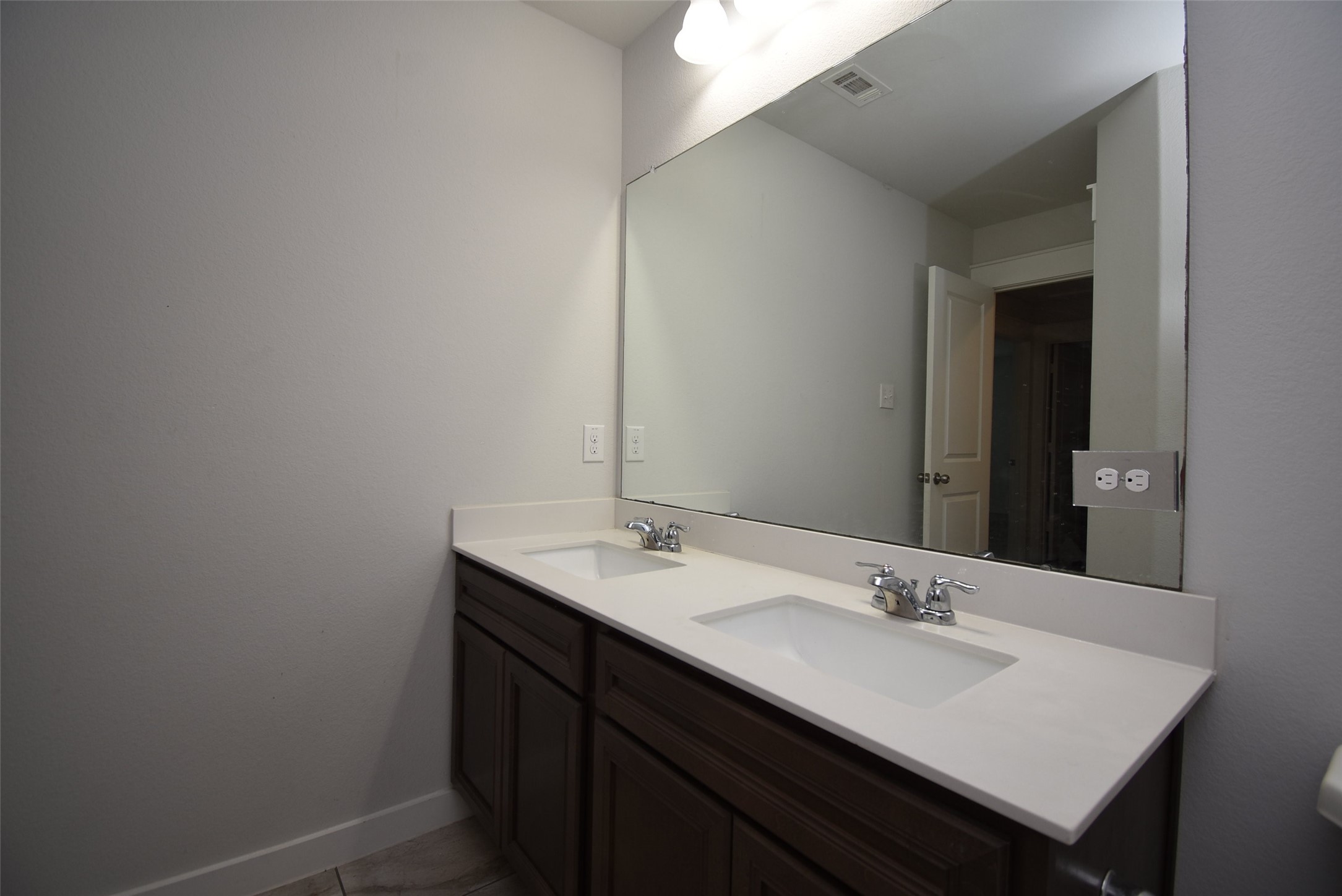 20602 Riley Copper Drive Cypress, TX 77433 - Photo 26 of 32 a bathroom with a sink and a mirror