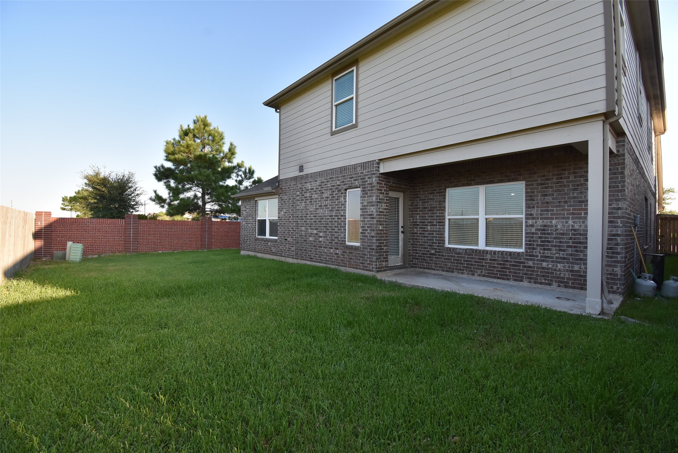 20602 Riley Copper Drive Cypress, TX 77433 - Photo 30 of 32 a front view of a house with a garden
