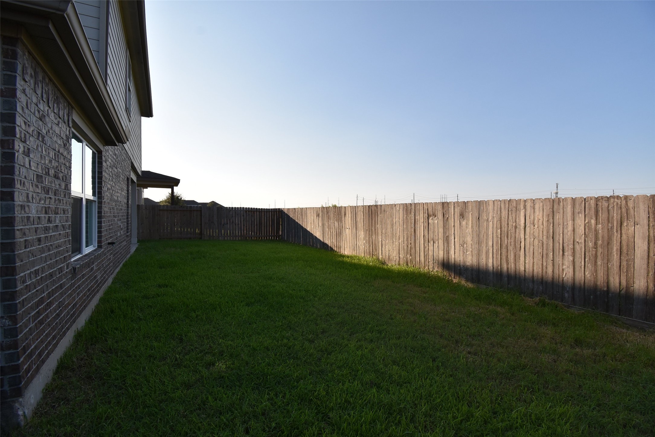 20602 Riley Copper Drive Cypress, TX 77433 - Photo 32 of 32 a view of a backyard with wooden fence