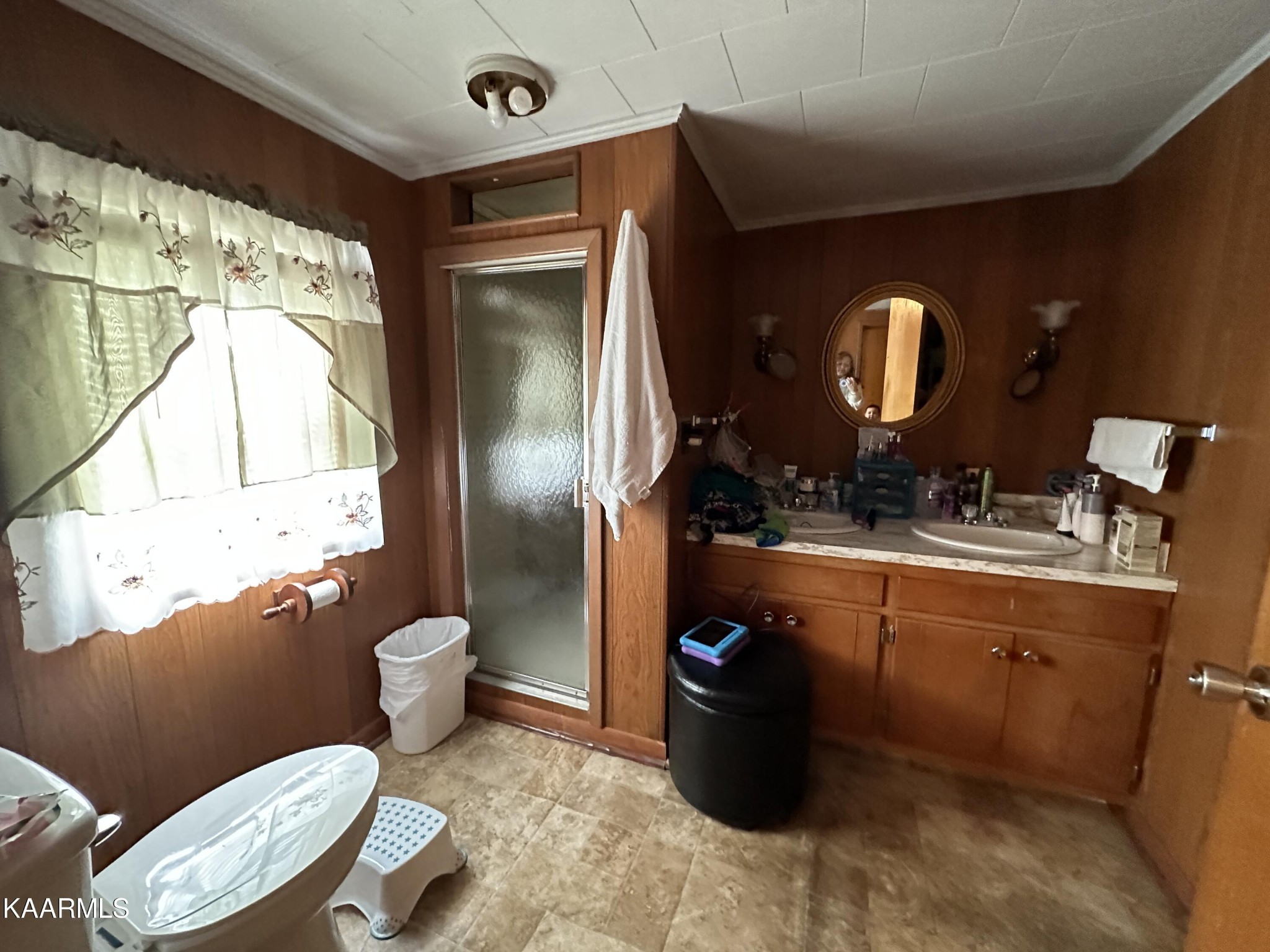 2270 Roslin Road Clarkrange, TN 38553 - Photo 55 of 60 a bathroom with a sink mirror vanity and toilet