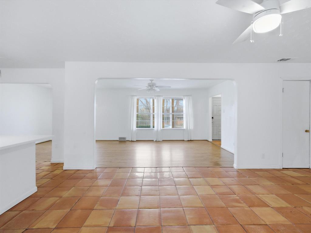 514 West Ridgewood Drive Garland, TX 75041 - Photo 16 of 39 a view of an empty room with a window