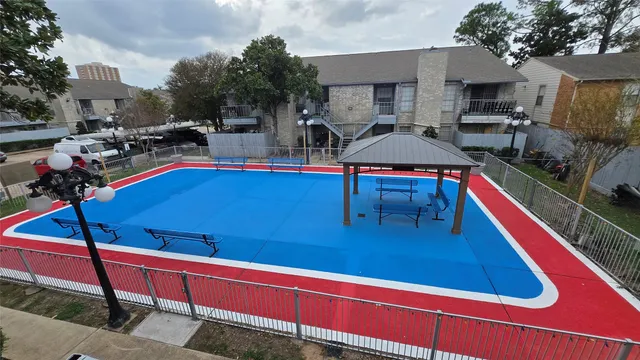 a view of a pool with a patio
