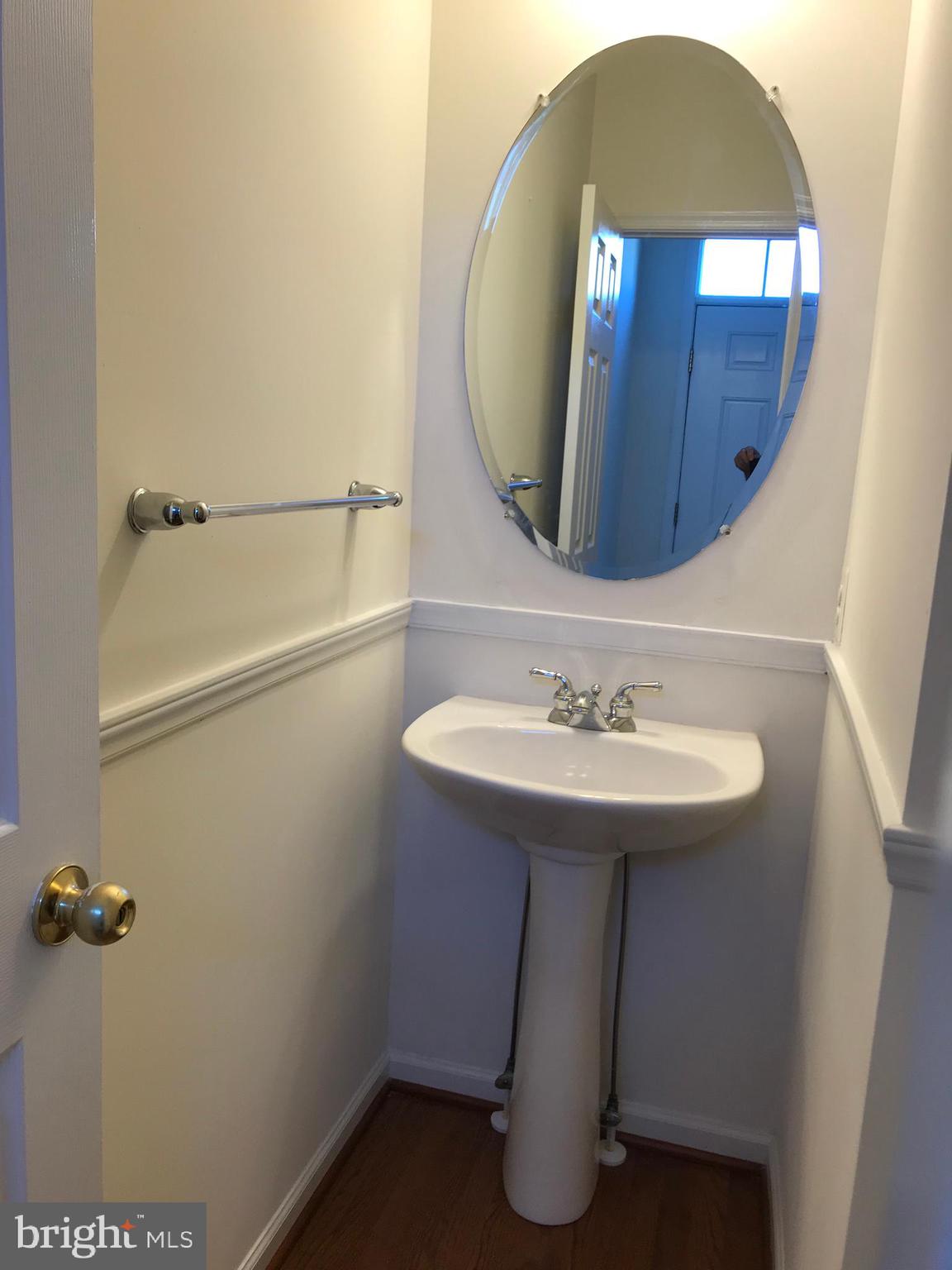 9730 Langley Road Baltimore, MD 21220 - Photo 2 of 31 main level half bath