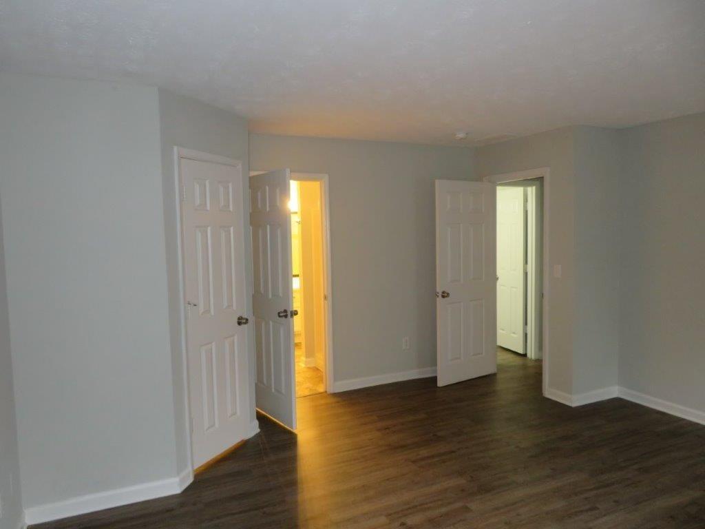 40 Lake Court Stockbridge, GA 30281 - Photo 19 of 24 a view of an empty room with wooden floor and closet