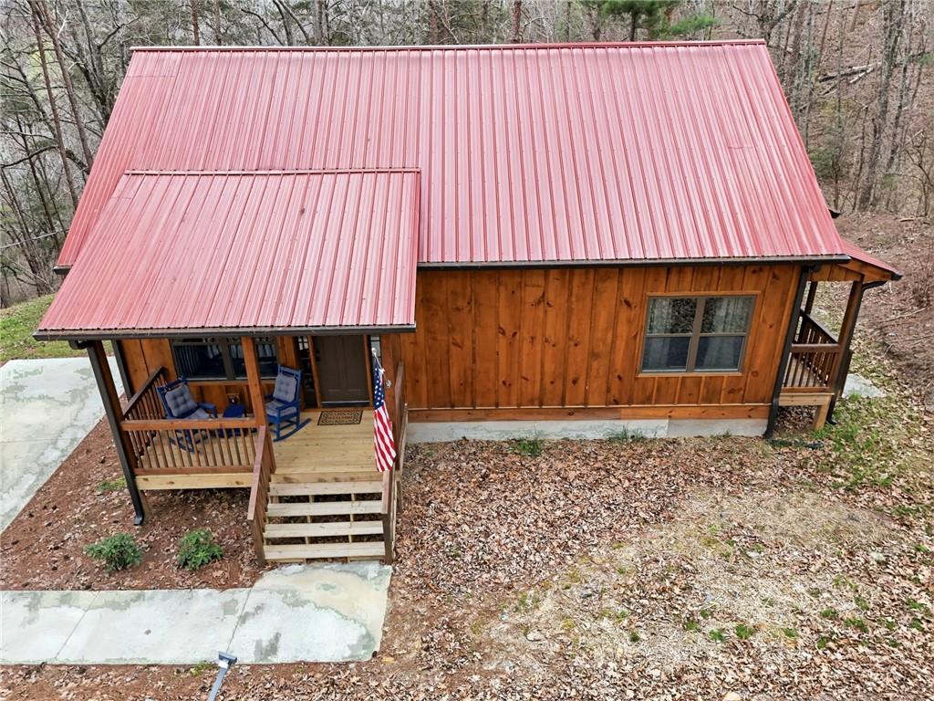 1041 Astro Court Northeast Ranger, GA 30734 - Photo 51 of 52 a backyard of a house with barbeque oven