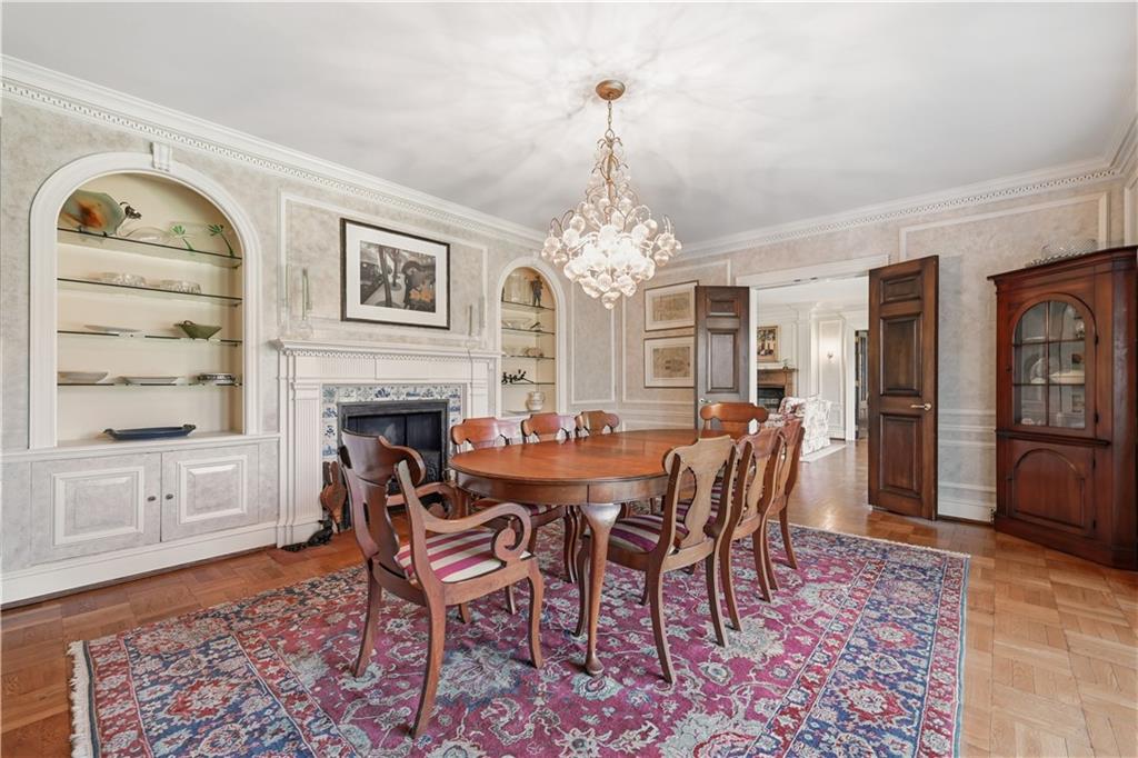 600 Backbone Road Sewickley, PA 15143 - Photo 15 of 50 The dining room is elegant, spacious, and beautifully detailed, with a fireplace, built-ins, hidden cabinets and lovely natural light. It is equally suited to holiday dinners and intimate evenings at home.