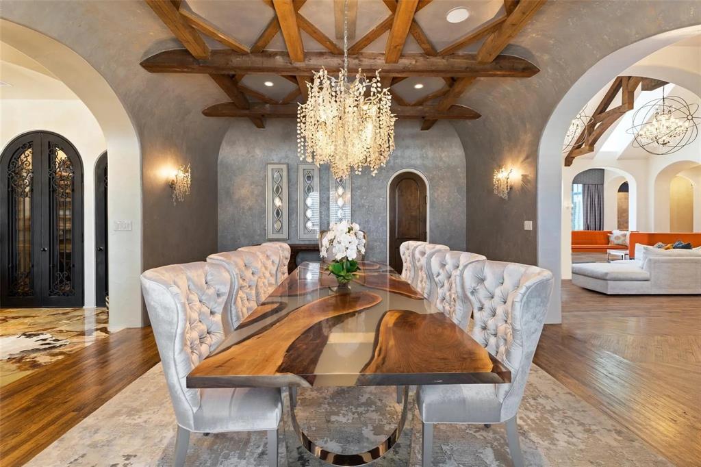 935 West Dove Road Southlake, TX 76092 - Photo 11 of 39 a view of a dining room with furniture and a chandelier