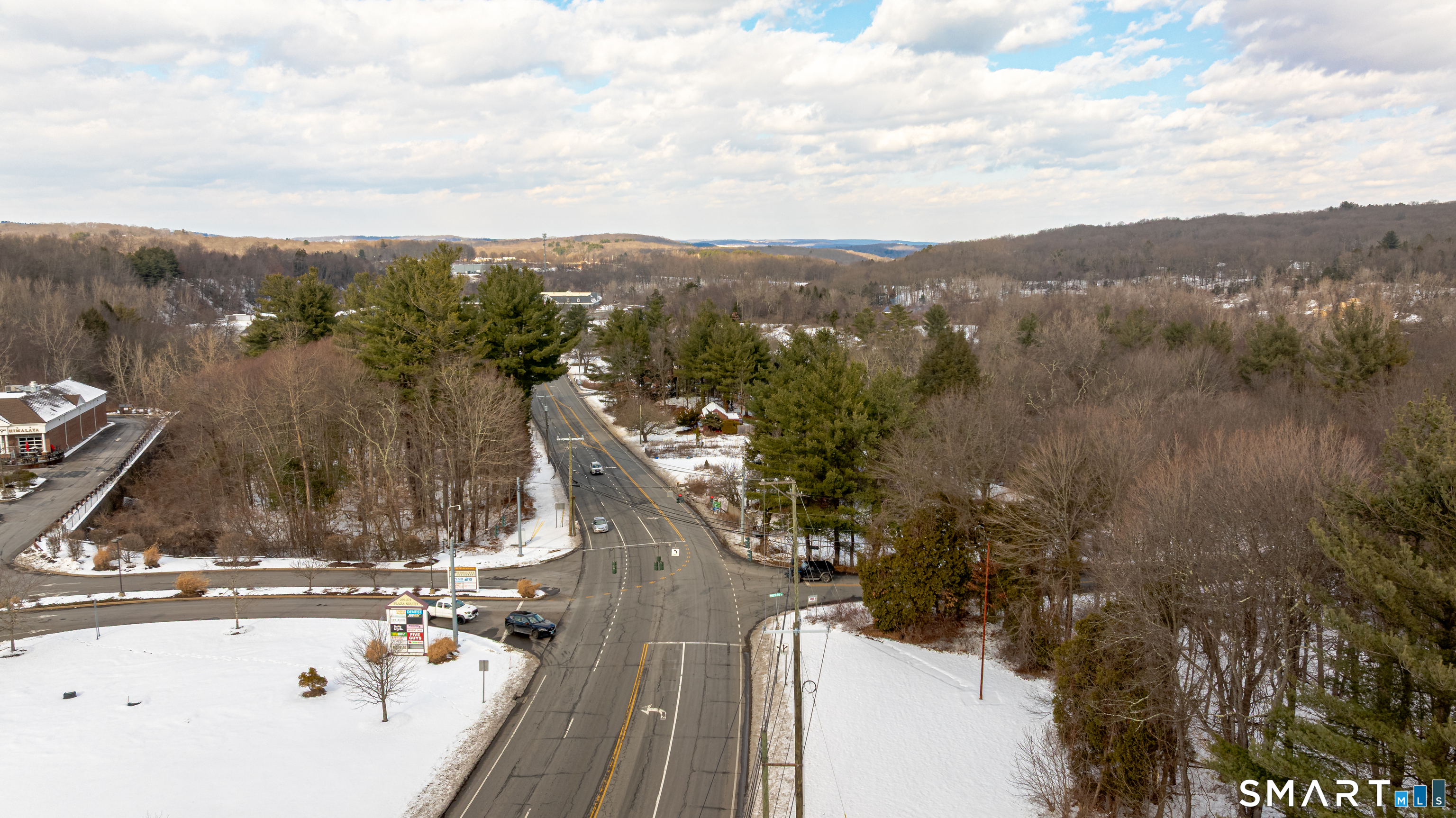 263-271 South Main Street Newtown, CT 06470 - Photo 11 of 24 a view of a house with a yard and mountain