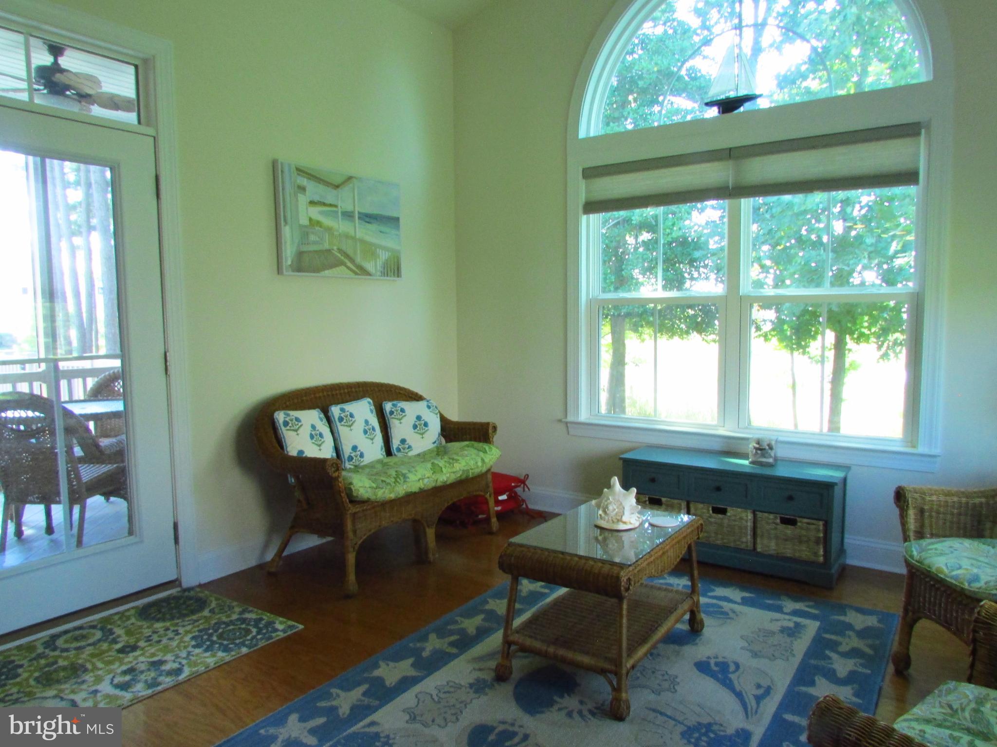 30671 Kingbird Court Ocean View, DE 19970 - Photo 18 of 21 a living room with furniture and a window