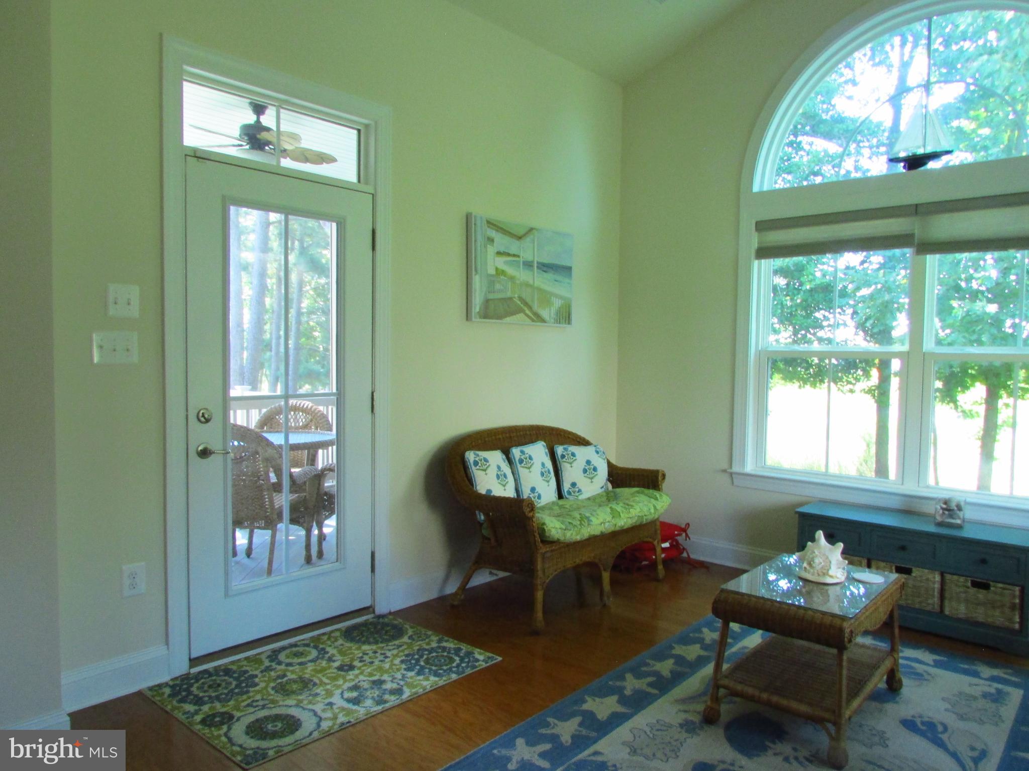 30671 Kingbird Court Ocean View, DE 19970 - Photo 9 of 21 a living room with furniture and a window