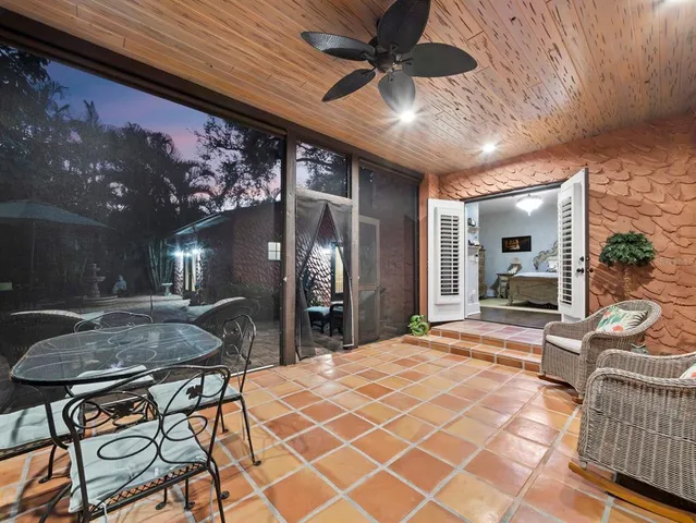 a view of a livingroom with furniture and a yard