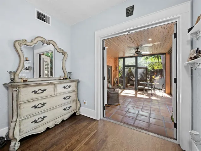 a view of living room with furniture and window