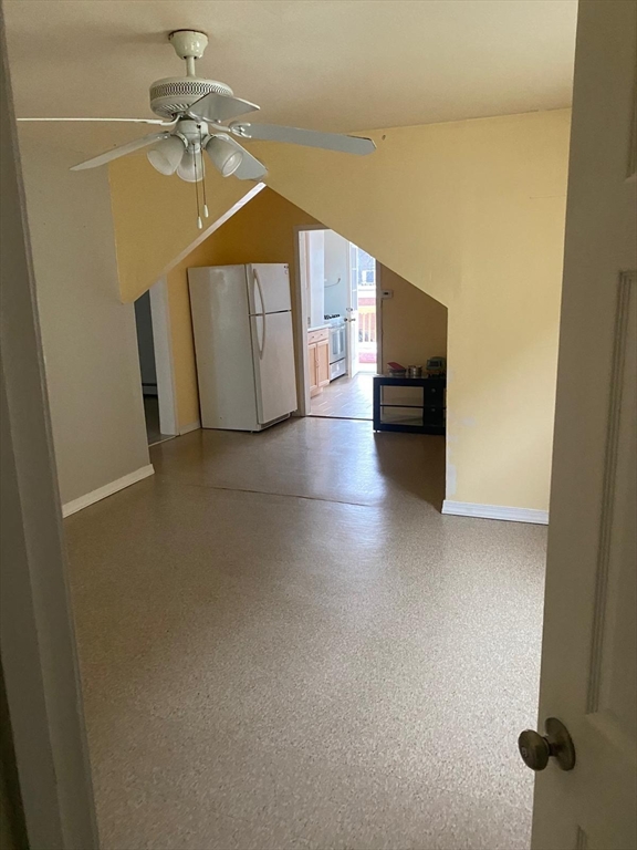 8-10 Cady Street Lowell, MA 01852 - Photo 2 of 11 a view of a livingroom with a staircase