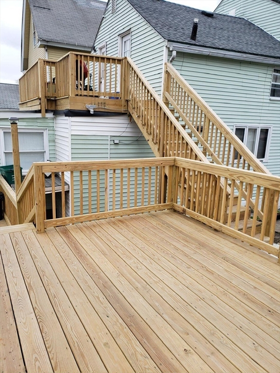 8-10 Cady Street Lowell, MA 01852 - Photo 3 of 11 a view of a house with wooden floor
