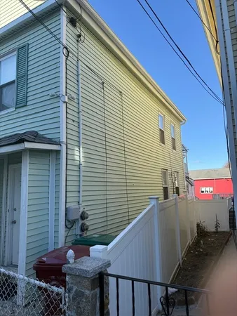 a backyard of a house with seating space