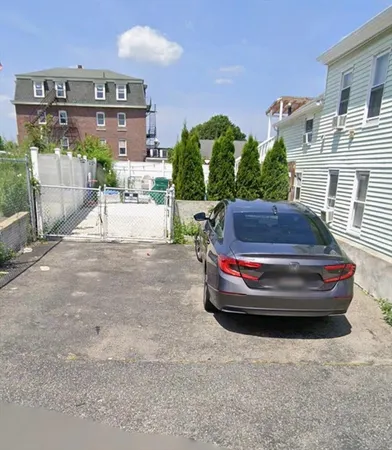 a view of a house with a back yard