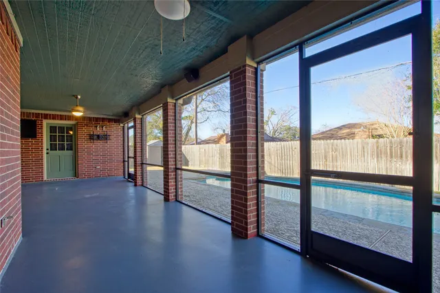 a view of gallery with wooden floor