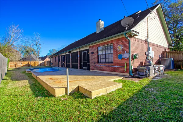 a view of swimming pool with a garden