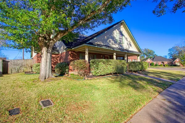 a view of a house with swimming pool