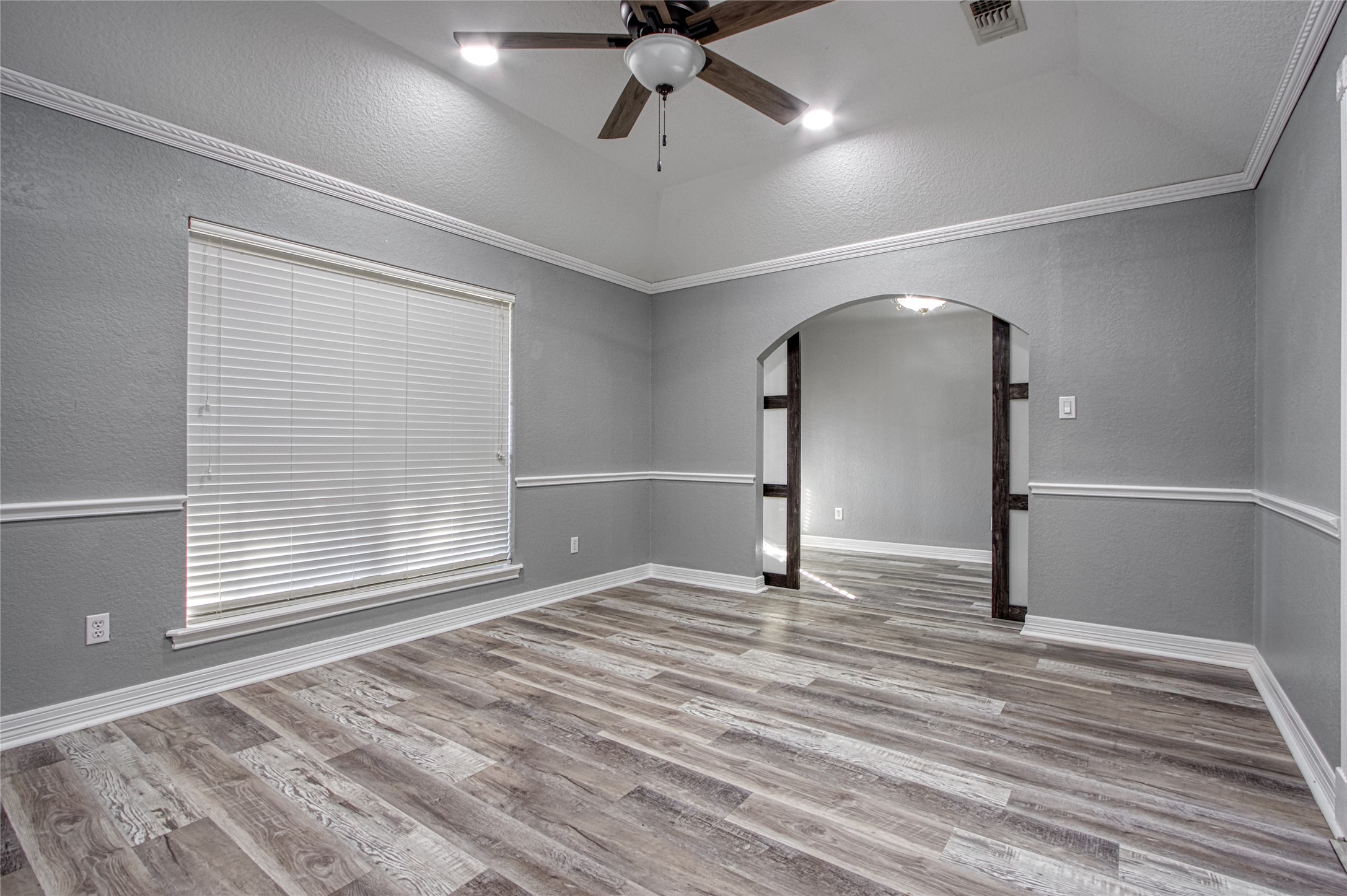 9 North Cay Angleton, TX 77515 - Photo 5 of 30 a view of empty room with wooden floor and fan
