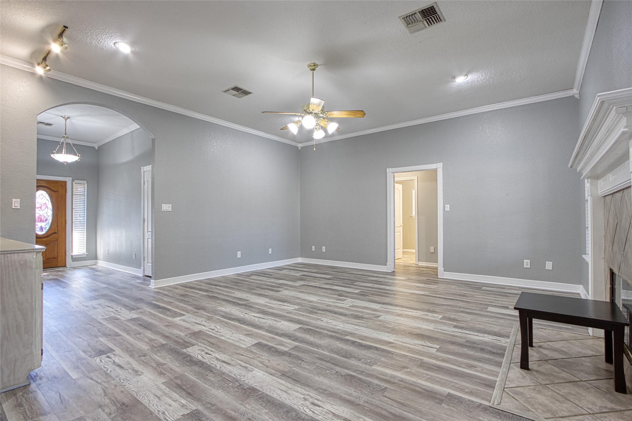 9 North Cay Angleton, TX 77515 - Photo 8 of 30 a view of an empty room with wooden floor and a window