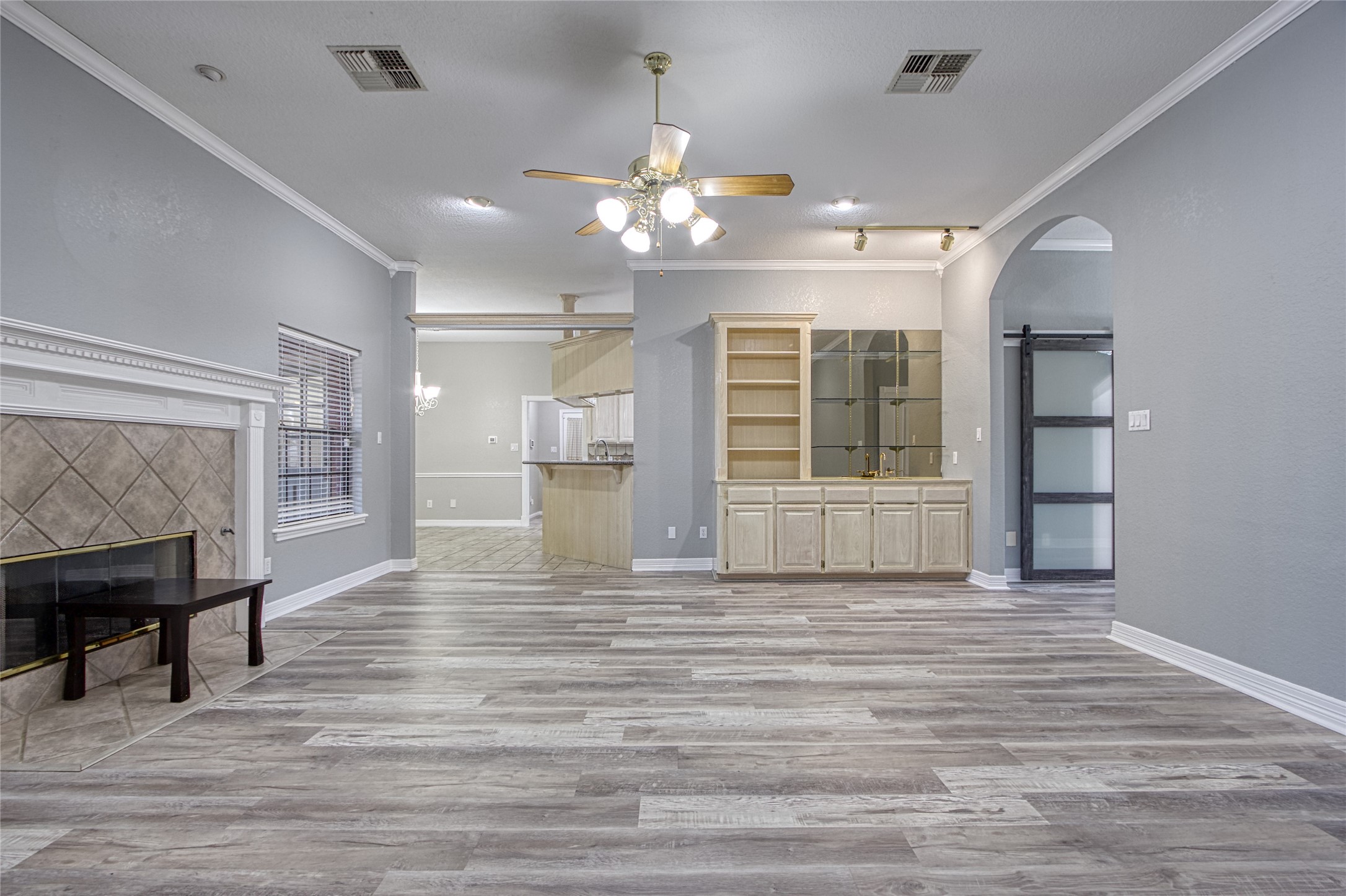 9 North Cay Angleton, TX 77515 - Photo 9 of 30 a view of an empty room with window and wooden floor