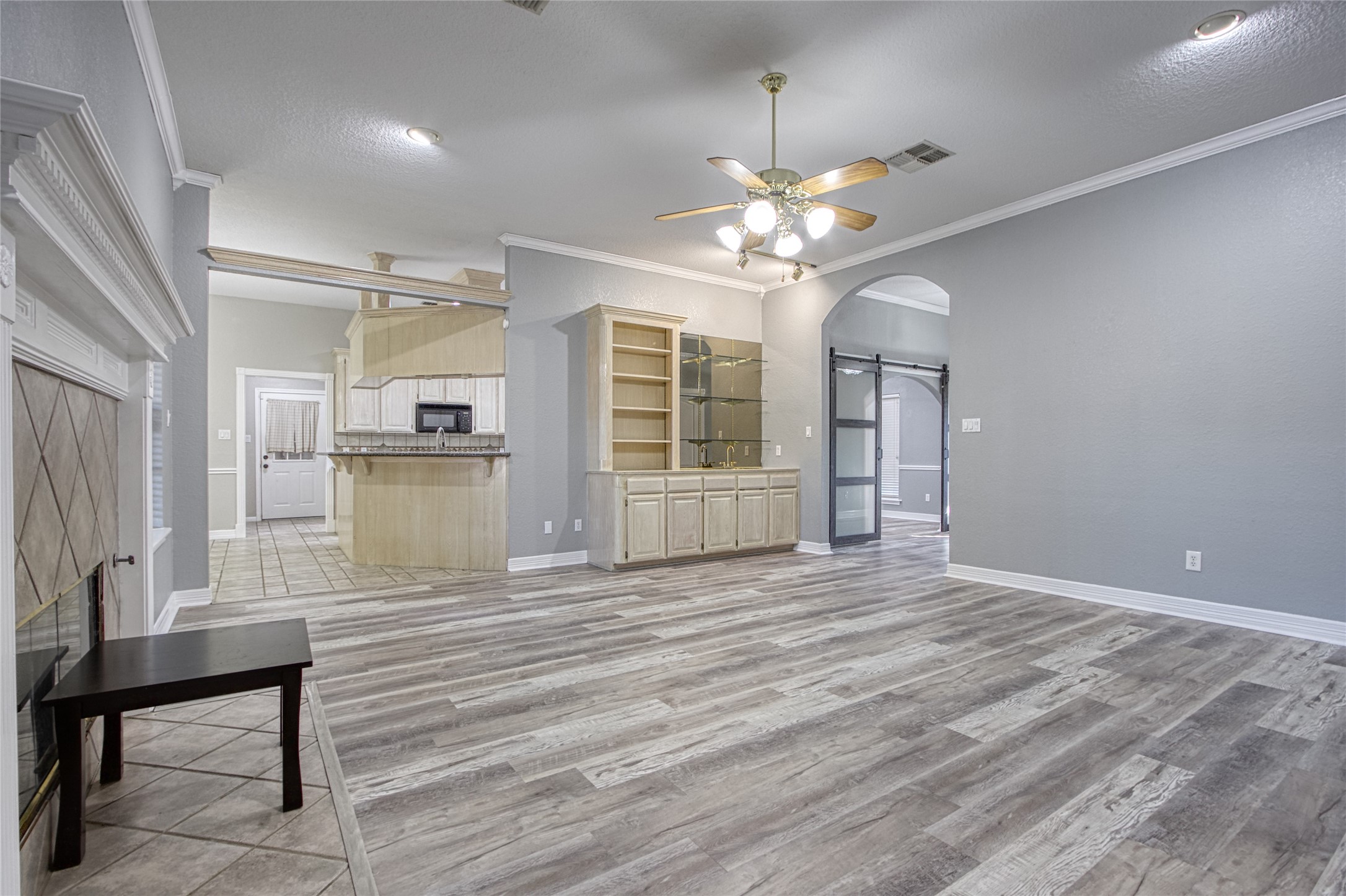 9 North Cay Angleton, TX 77515 - Photo 10 of 30 a view of an empty room with a window and wooden floor