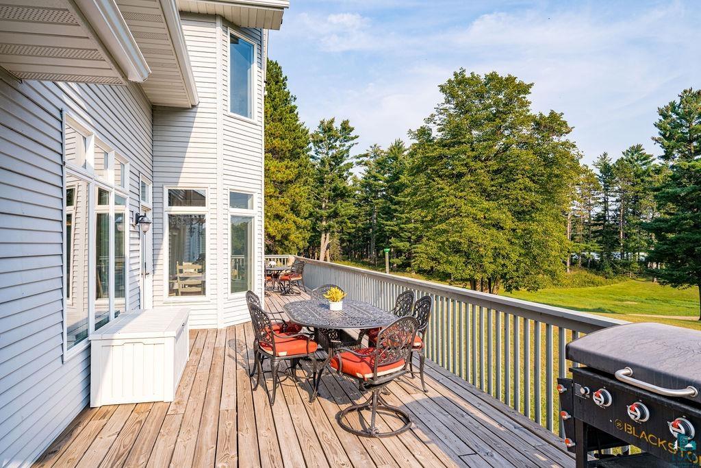 3168 Pioneer Road Barnum, MN 55707 - Photo 21 of 46 This HUGE deck has ample room for multiple tables and outdoor entertaining nearly all year long!