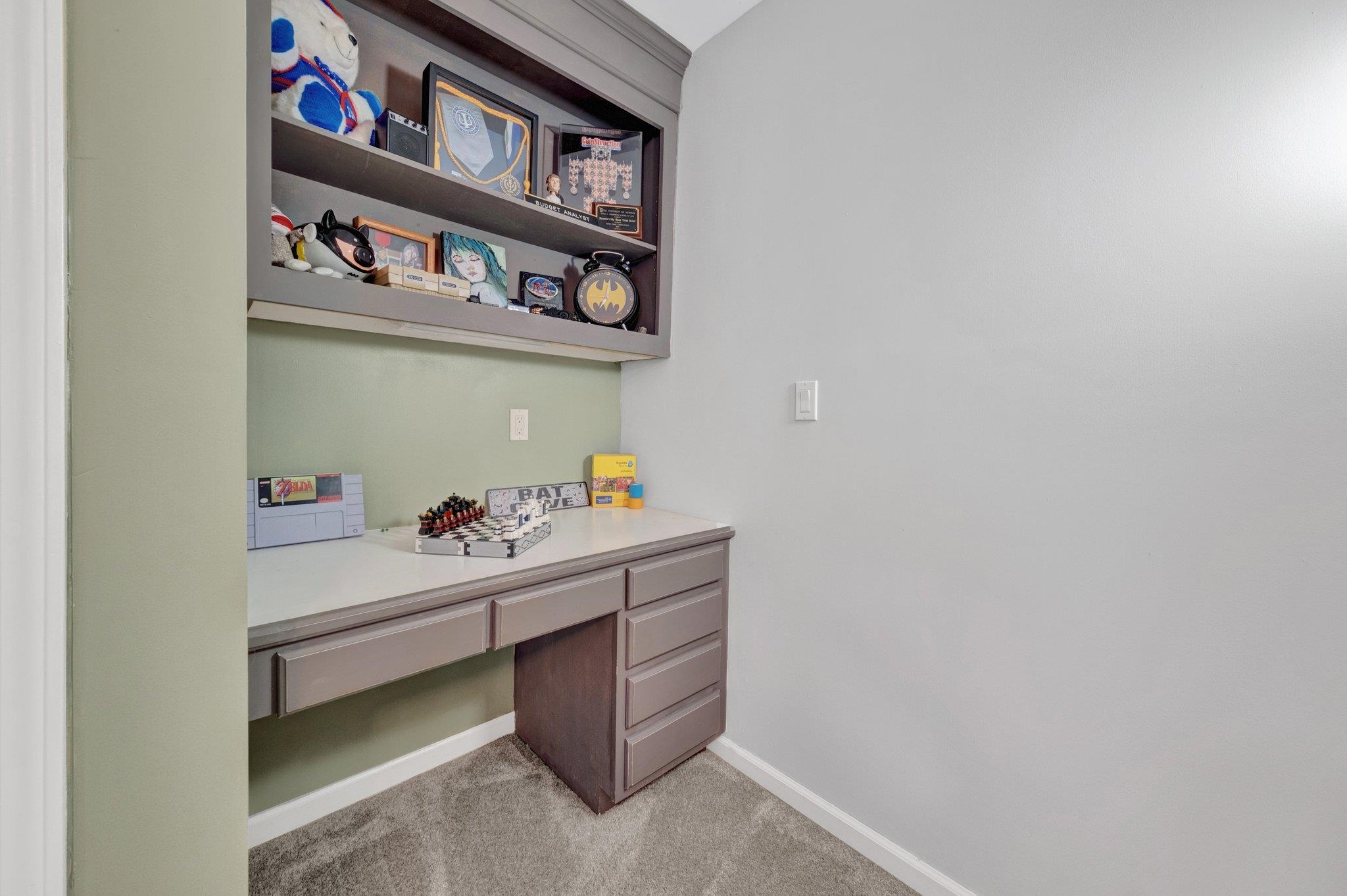 2710 Roland Road Memphis, TN 38002 - Photo 19 of 34 Office area with built in desk and light colored carpet