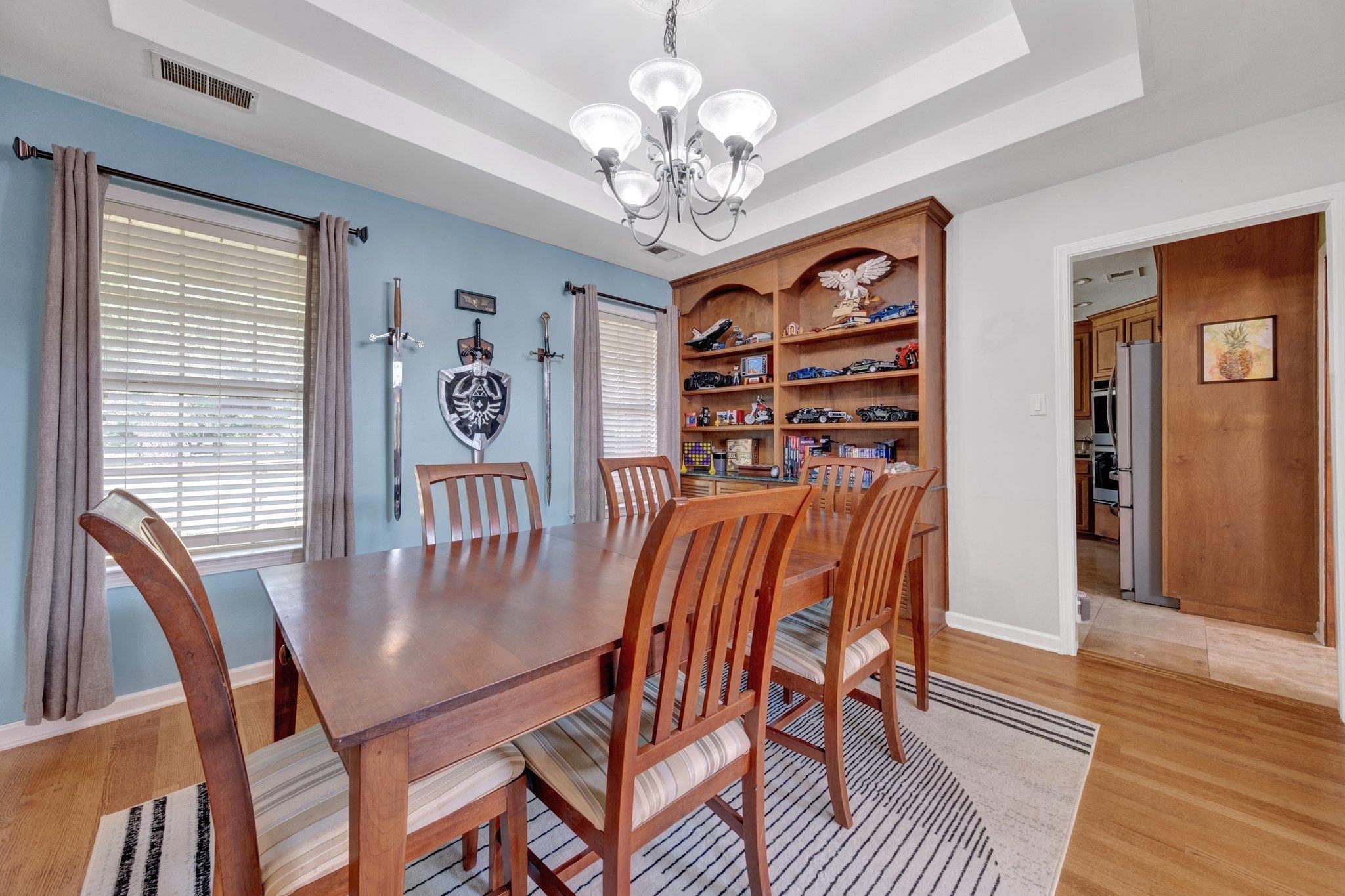 2710 Roland Road Memphis, TN 38002 - Photo 8 of 34 Dining room featuring a chandelier, plenty of natural light, and light wood finished floors