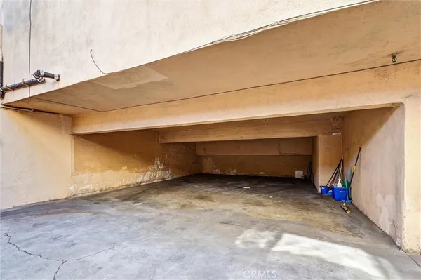 a view of a car park in front of house