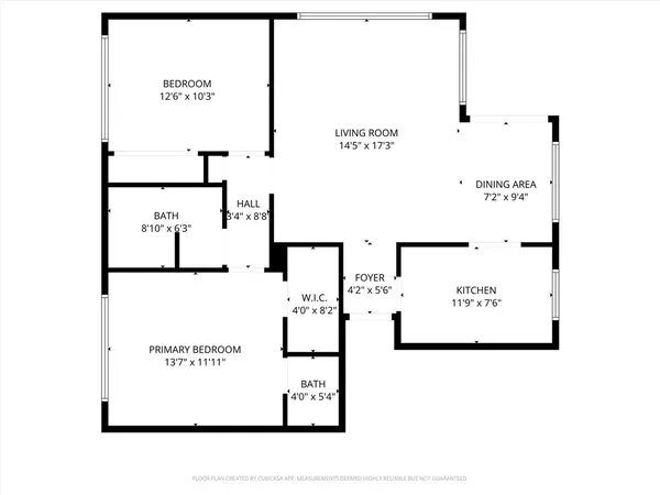 a kitchen with stainless steel appliances white cabinets and a stove