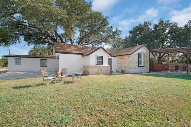 a house view with a outdoor space