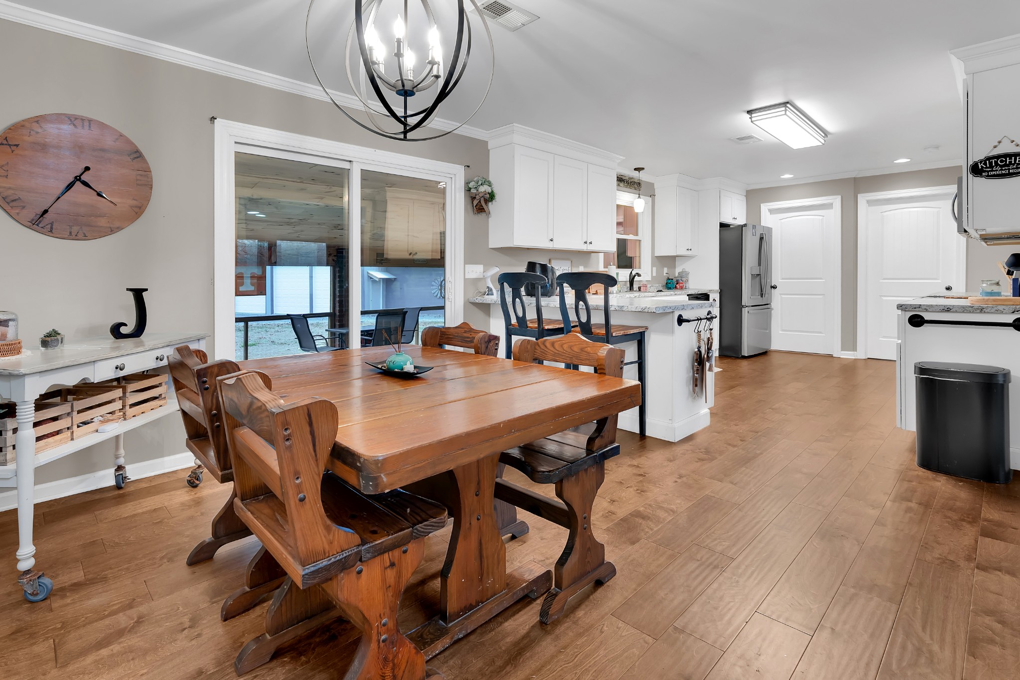 3197 Matts Hollow Road Manchester, TN 37355 - Photo 13 of 54 a view of a dining room with furniture and a large window
