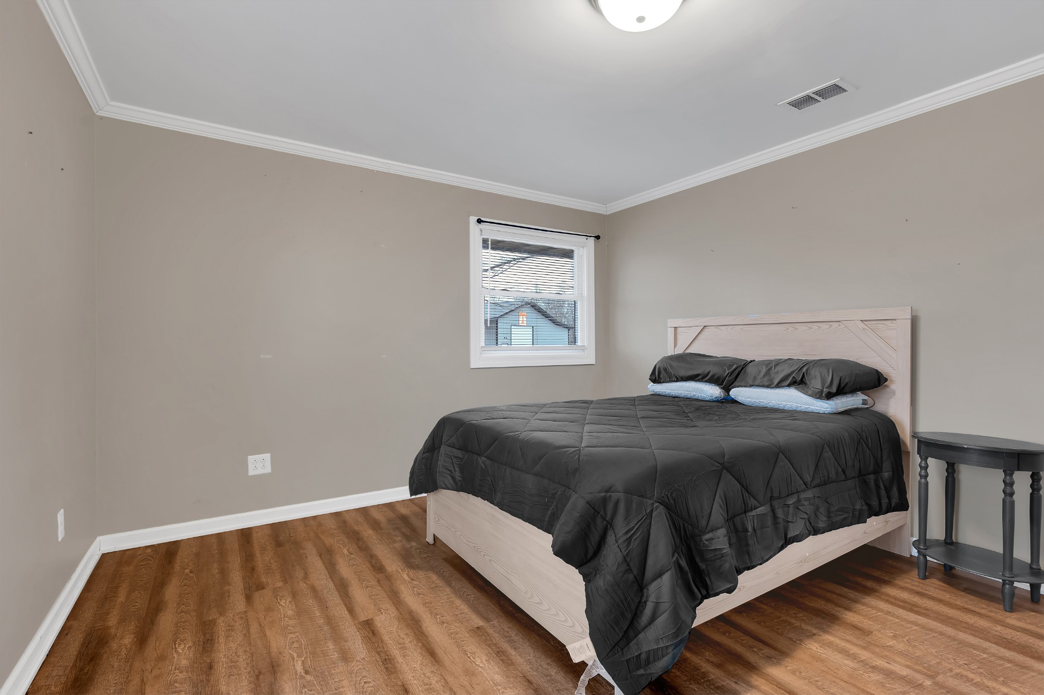 3197 Matts Hollow Road Manchester, TN 37355 - Photo 29 of 54 a bedroom with a bed and window
