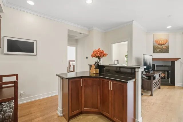 a kitchen with a stove and a refrigerator