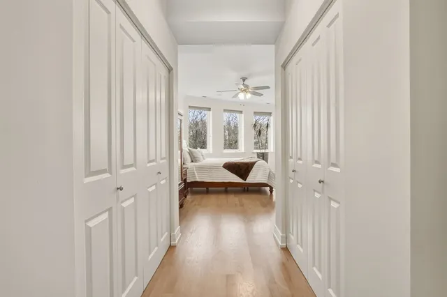 a bedroom with furniture and a window