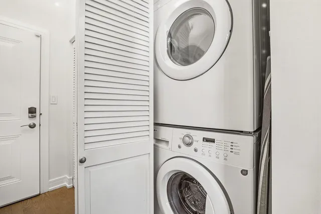 a utility room with dryer and washer