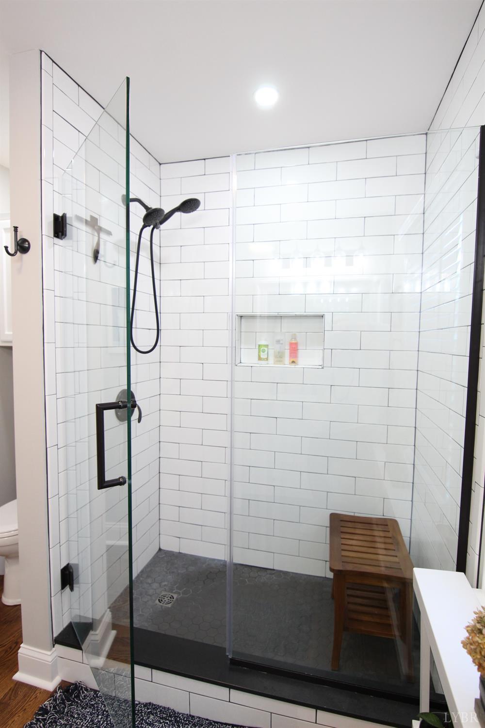 609 Midvale Street Lynchburg, VA 24502 - Photo 12 of 18 a bathroom with a shower