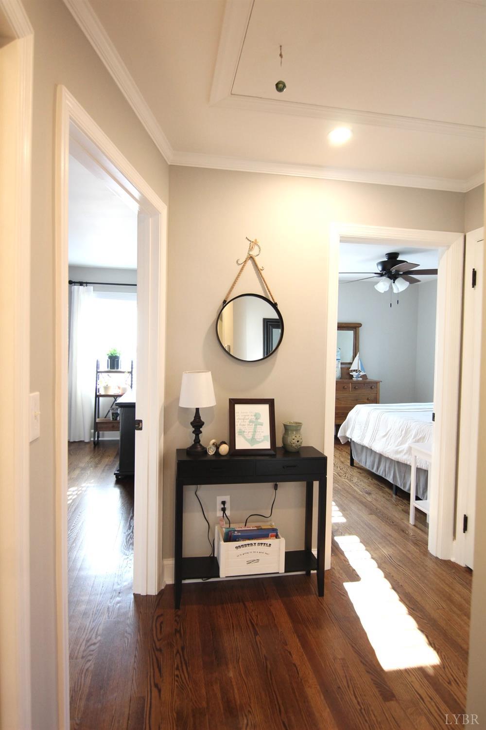 609 Midvale Street Lynchburg, VA 24502 - Photo 6 of 18 a bedroom with furniture and a mirror