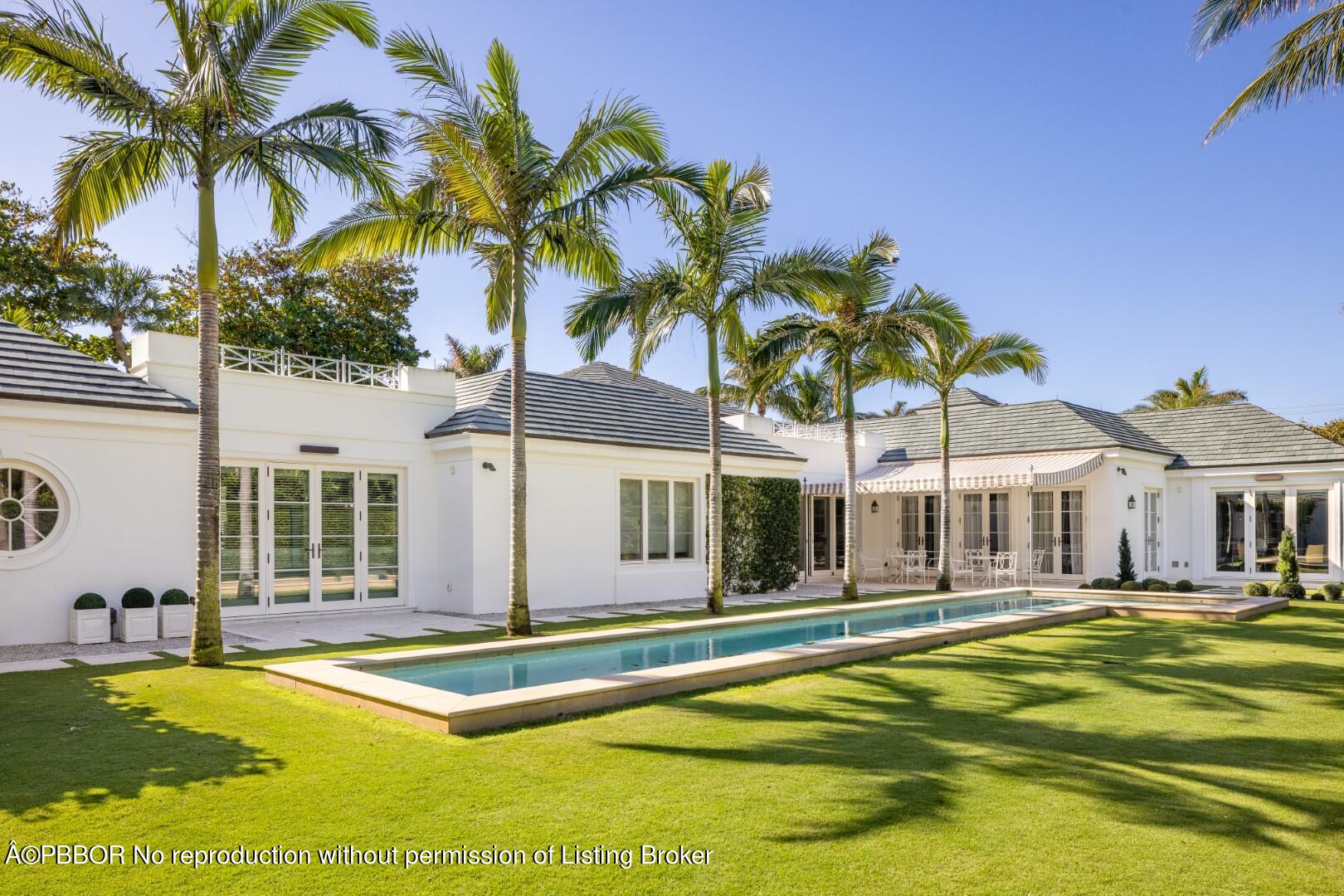710 South County Road Palm Beach, FL 33480 - Photo 51 of 69 a view of a house with swimming pool and porch