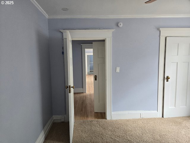 2083 Northwest Johnson Street, Unit 5 Portland, OR 97209 - Photo 13 of 15 a view of a hallway with wooden floor and closet